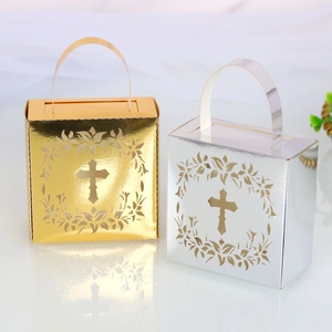 Detailed laser-cut cross design on gold and silver hollow wedding favor candy boxes