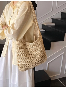 Minimalist beige hollow crochet straw tote bag for beach vacations and daily use