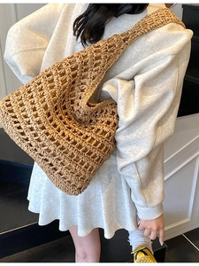 Hollow straw shoulder bag in oatmeal beige for summer beach vacations and daily leisure