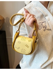 Ginger yellow minimalist saddle bag with cute cartoon bear embossing and top handle