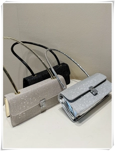 Three rhinestone shoulder bags in black, gold, and silver finishes shown from side view