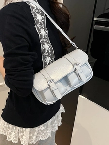 Vintage light blue shiny patent leather shoulder bag with buckle details and front pockets
