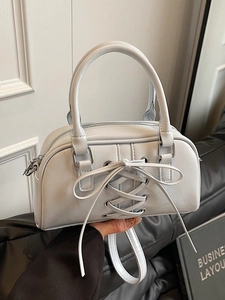 Elegante borsa Boston grigio chiaro con fiocco stringato e occhielli in metallo