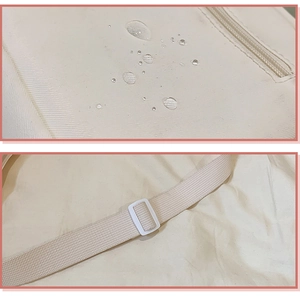 Détail du tissu en nylon imperméable avec gouttes d'eau et bandoulière réglable