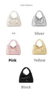 Five assorted colors of baguette bags with drawstring bow details and metal charms
