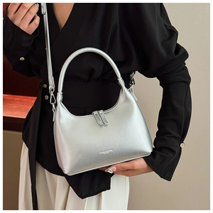 Detail of silver oil wax leather handbag with LOUIS SAMANI logo and smooth zipper closure