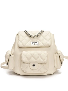 Elegant cream quilted mini backpack with metal chain handle and silver hardware