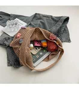 Interior view showing the large capacity and storage space of the floral crochet tote bag