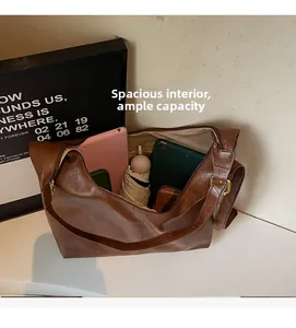 Internal view of large brown PU tote bag showing space for tablet and essentials