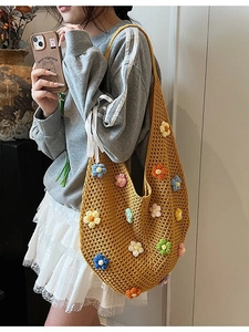 Handmade crochet hobo shoulder bag in mustard yellow with colorful 3D floral accents