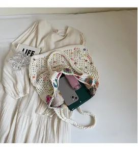 Detailed interior of crochet tote bag showing large capacity for essentials