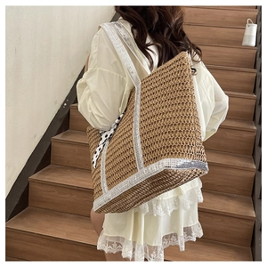 Straw tote bag with sequin strap and polka dot scarf shown in lifestyle scene
