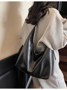 Classic black PU leather hobo tote bag with textured finish for daily commuting
