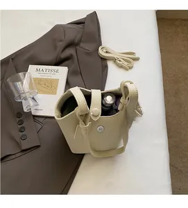 Detailed view of beige lychee pattern bucket bag with spacious interior for daily essentials