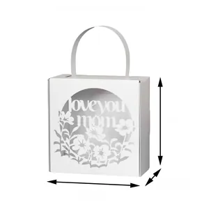 Detail of white laser-cut Mother's Day candy box with Love You Mom floral pattern