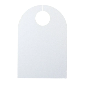 Macro detail of white frosted place cards with circular cutouts for wine glasses