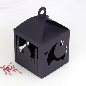Laser-cut black paper lantern gift box with star and moon hollow patterns for Ramadan decor