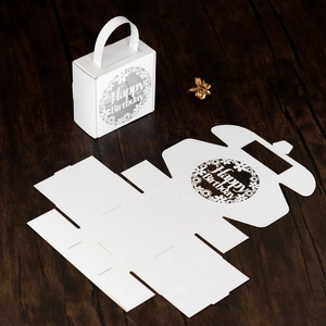 Detailed assembly view of white laser-cut Happy Birthday candy box with paper gift bag