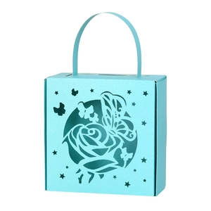 Light blue laser cut butterfly and rose paper wedding favor box with handle