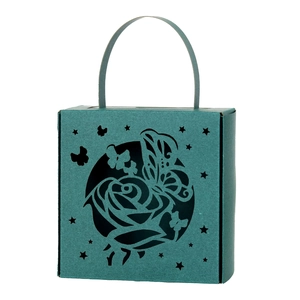 Teal laser-cut candy box with rose and butterfly motifs for weddings and festive parties