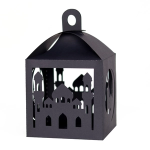 Black paper lantern with laser-cut mosque design and moon stars for festive decoration
