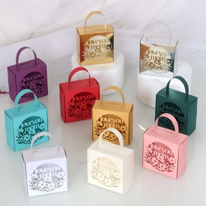 Collection of laser-cut gift boxes with Love You Mom text in various vibrant colors