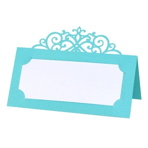 Elegant Tiffany blue laser-cut table name card with intricate floral patterns and white insert