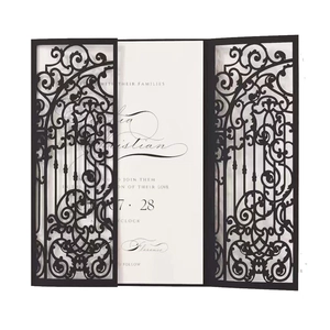 Laser cut gatefold wedding invitation in black with ornate European floral patterns