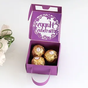 Detail of purple birthday gift box featuring laser cut Happy Birthday floral wreath