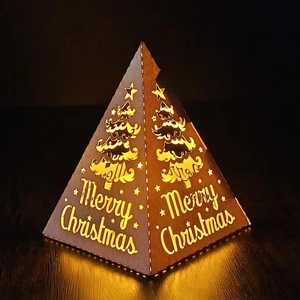 Hollow-out pyramid Christmas LED lantern with warm glowing Merry Christmas carving