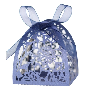 Elegant laser-cut hollow rose wedding candy gift box in blue with a decorative ribbon bow