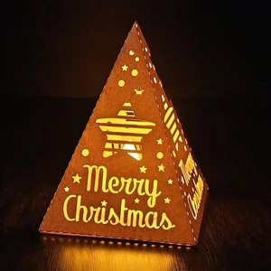 Pyramid Christmas tree lamp with hollow star pattern and warm Merry Christmas lighting