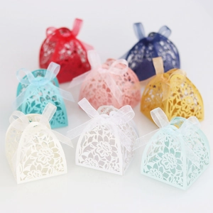 Laser cut floral hollow candy gift box with elegant ribbon bow for wedding and party