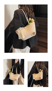 Detail of cream woven tote bag featuring white lace ribbon, sunflower and pearl accent