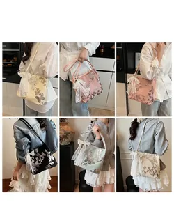 Detail of embroidered sequin butterfly tote bag with lace bow and pearl charm in six colors