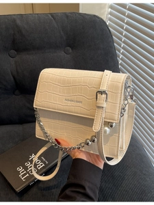 Fashionable creamy white crocodile pattern crossbody bag with pearl chain detail