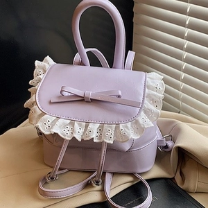 Elegante mini mochila lavanda con borde de encaje blanco y lazo lindo para mujer