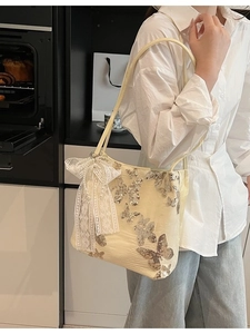 Pale yellow butterfly embroidery tote bag with pearl lace bow and silver sequins