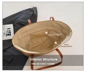 Dettaglio interno della grande borsa tote intrecciata con scomparto principale