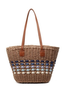 Handcrafted woven straw tote bag with blue gradient stripes and brown leather handles