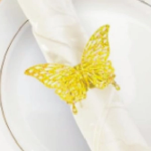 Glittery gold butterfly napkin ring with intricate laser cut hollow wings for weddings