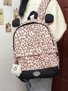 Pink leopard print backpack with cat ears and plush charm for student travel and school