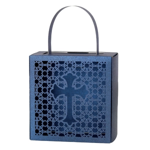 Detail showing the laser-cut cross design and glitter texture on this navy blue gift box