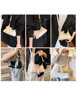Sac baguette chic forme dumpling en plusieurs couleurs avec nœuds en dentelle et perles