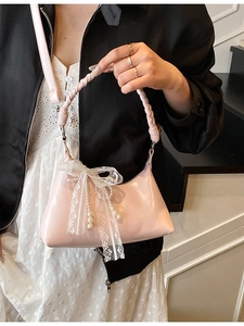 Sac à main rose avec nœud en dentelle blanche et pompons en perles pour femme chic