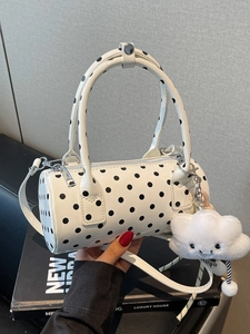 Polka dot cylinder handbag in white lacquer with cloud charm and detachable strap