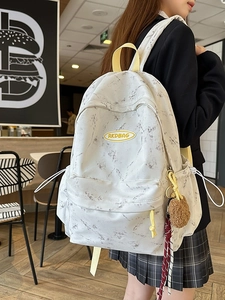 Mochila blanca con estampado de mármol para estudiantes con correas amarillas y pompón