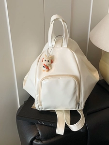 White geometric patent leather tote backpack with creative 3D design and cute bunny charm