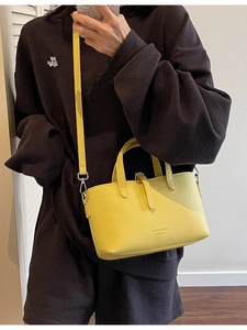 Fashionable bright yellow lychee leather handbag with adjustable long strap for women
