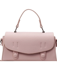 Pink lychee grain leather crossbody bag with top handle and minimalist flap design